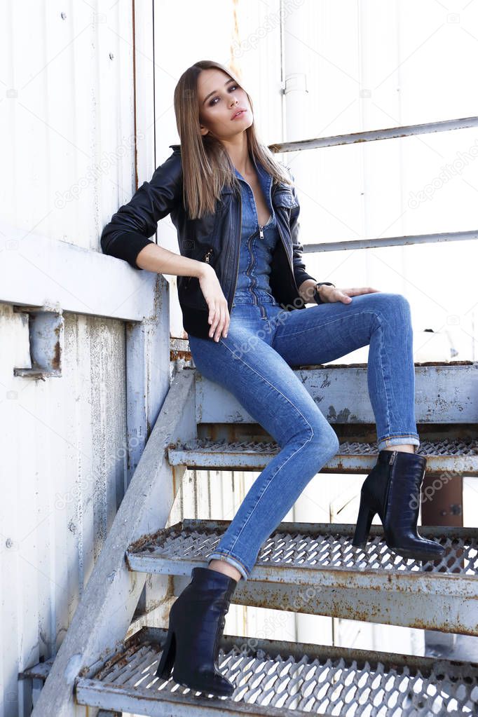 stylish woman wearing jeans overall