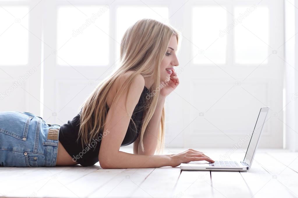 young woman using laptop 