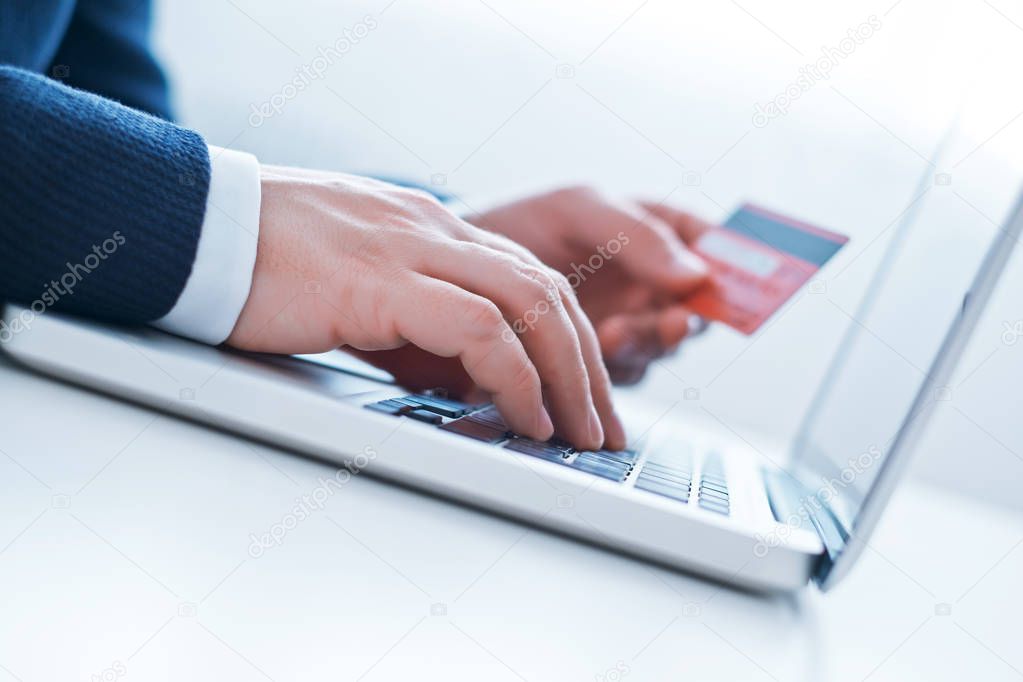 Businessman using credit card 