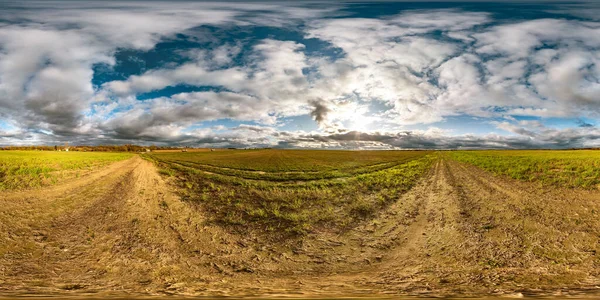 Full seamless spherical hdri panorama 360 degrees angle view among fields in autumn sunny day with awesome clouds in equirectangular projection with zenith and nadir, ready for VR AR virtual reality — Stock Photo, Image