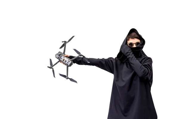 female spy in black clothes and round glasses with a drone isolated on white background