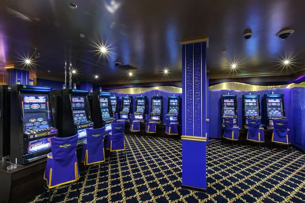 LAS VEGAS, USA - MAY, 2017: interior of elite luxury vip casino with rows of gambling slots machine in classic blue style color — Stock Photo, Image