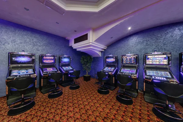 LAS VEGAS, USA - MAY, 2017: interior of elite luxury vip casino with rows of gambling slots machine in classic blue style color — Stock Photo, Image