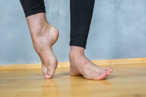 Barefoot Female Feet Black Leggings Wooden Floor — Stock Photo, Image