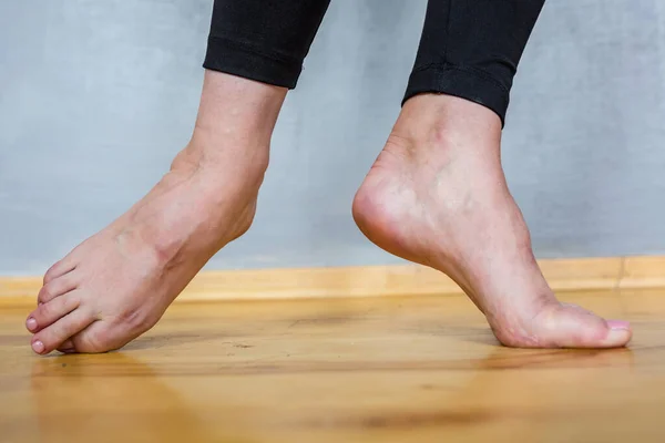 Barefoot Female Feet Black Leggings Wooden Floor — Stock Photo, Image