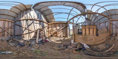 abandoned ruined wooden barn. full seamless spherical hdri panorama 360 degrees angle view in sunny day in equirectangular projection, ready for VR virtual reality content clipart