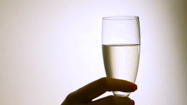 Glass of champagne in Female Hands