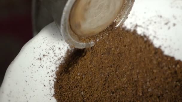 Grinding the coffee beans in the old coffee grinder — Stock Video