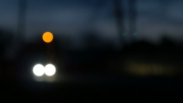 Faros de un coche por la noche — Vídeos de Stock