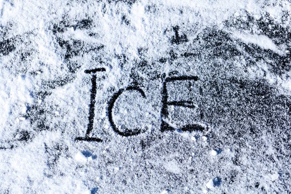Inscription de glace sur neige blanche — Photo