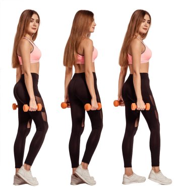 Güzel, kadın spor giyim bölümünde duruyor. Dar, atletik vücut, ince, düz mide. Dambılları elinde tutuyordu. Pazıları, göğüs kaslarını indirin. Kuruyor. Fitness yap. Beyaz arkaplan, izole et.