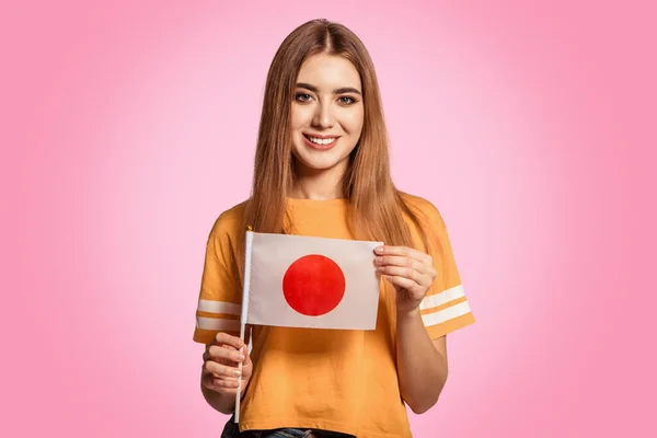 Een Mooie Jonge Vrouw Houdt Vlag Van Japan Haar Handen — Stockfoto