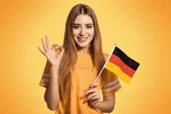 Beautiful Young Woman Holds Her Hands Flag Germany Shows Sign — Stock Photo, Image