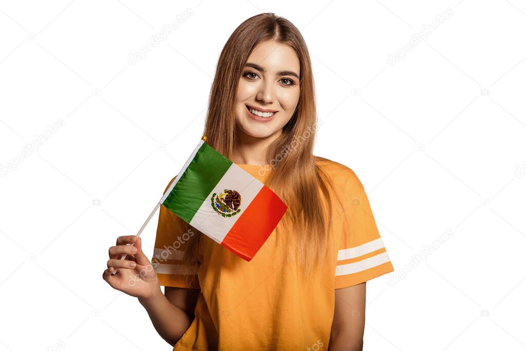 A beautiful young woman holds in her hands the flag of Mexico. Exchange student, learn language. Tourist traveling. White background. Isolate. Football fan.