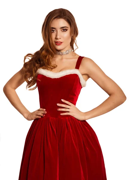Όμορφο Νεαρό Κορίτσι Ένα Κόκκινο Χριστουγεννιάτικο Φόρεμα Λευκό Φόντο Απομόνωσε — Φωτογραφία Αρχείου