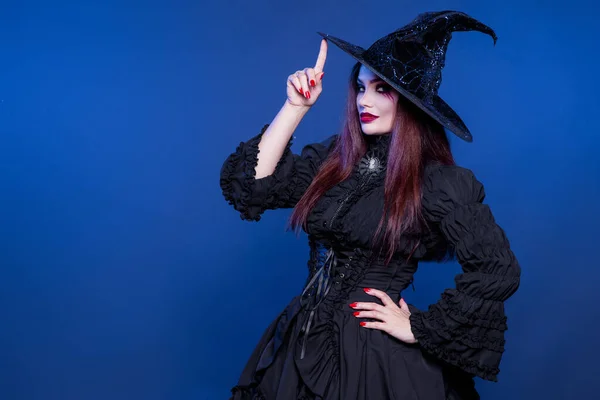 Beautiful Woman Vampire Witch Corrects Witch Hat Her Finger Costume — Stock Photo, Image