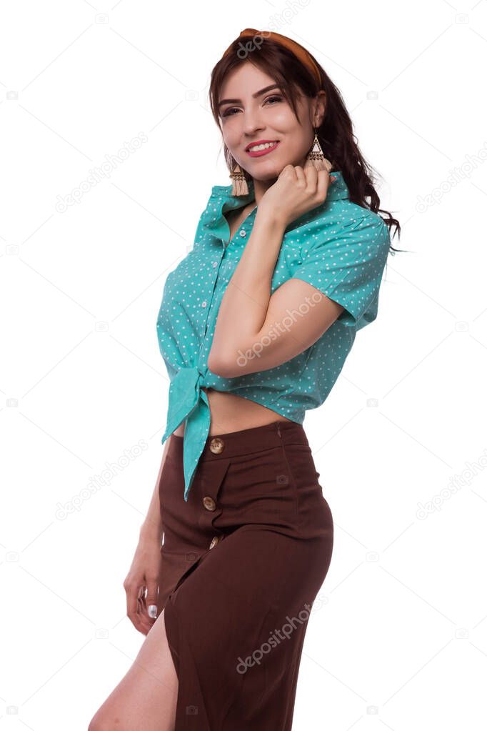 Beautiful brunette woman wearing a blouse, skirt and a chelma with.. Adult lady in pinup image, tourist for a walk. White background, isolate. Life style. Sexy housewife.