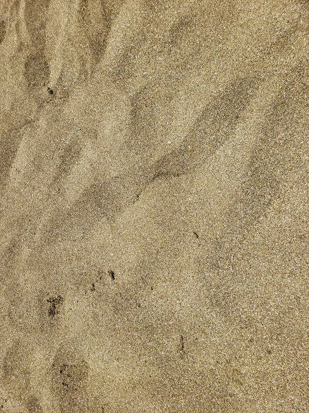 砂の質感。砂浜を背景に。トップ表示 — ストック写真