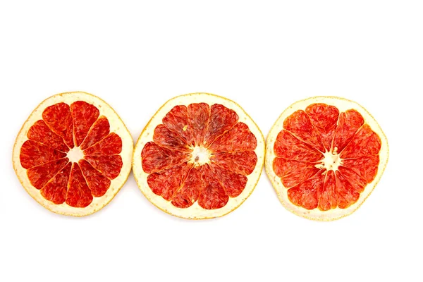 白を基調とした3枚のドライグレープフルーツのクローズアップ — ストック写真