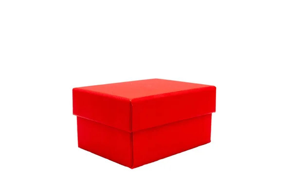 Une boîte rouge de cadeaux sur fond blanc — Photo
