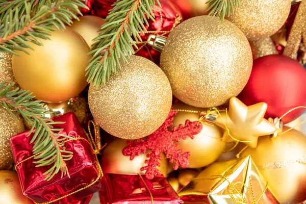 Christmas composition on a white sheet with a Christmas balls and boxes and angels Stock Picture