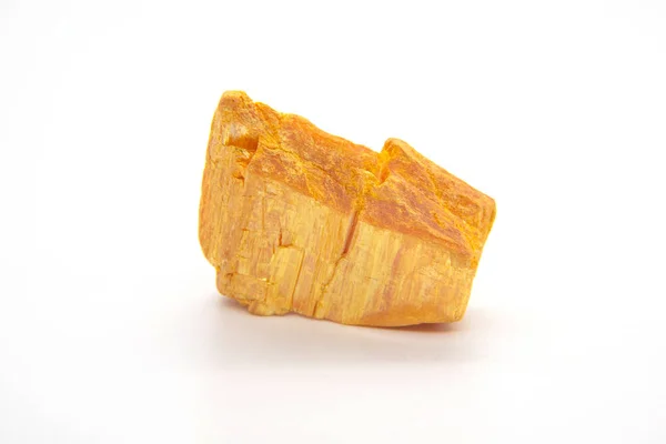 Orpiment mineral - arsenic sulfide isolated on white Stock Image