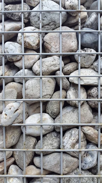 Iron net with stones pattern, abstract background