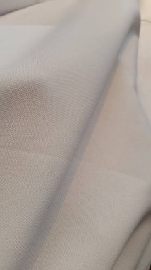 Beyaz kumaş desenine yakın plan, soyut arkaplan