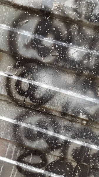 Oilduk. Rumpad genomskinlig film med silverglans och text — Stockfoto