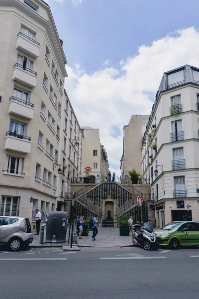 PARIS, FRANCE - CIRCA JUNE 2017: One of Invader's aliens pixel art piece by Space Invader artist on the wall of a buildings in Le Marais district in Paris on a sunny day, France in June 2017. — Stock Photo, Image