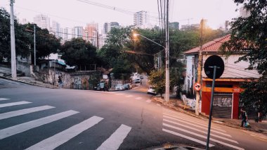 SAO PAULO, BRAZIL - CIRCA SEPTEMBER 2019: hilly landscape and sloping streets in bohemian Vila Madalena neighborhood with a lot of street art in Sao Paulo.