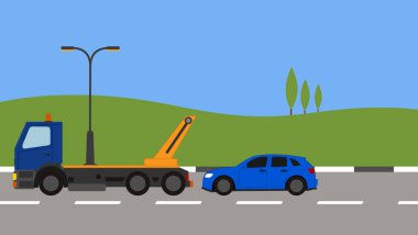 Tow truck picking up a car in town clipart