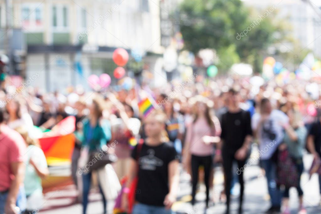 Blurred picture of participants of a gay pride