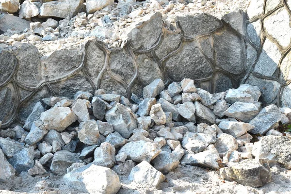 Reparación del muro de contención autodoor. construcción obras al aire libre —  Fotos de Stock