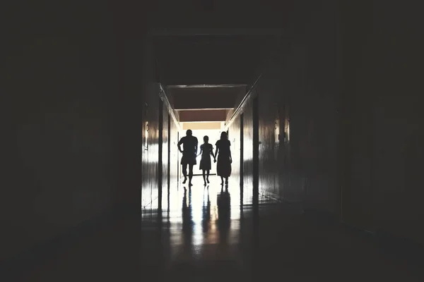 Dead person in building. Creepy house with ghosts. Paranormal people. scary corridor with light. The restless souls of dead — Stock Photo, Image
