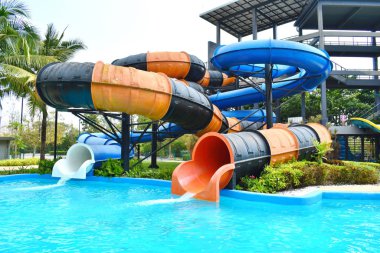 Speed slides at the water Park. Leisure and entertainment in the summer.