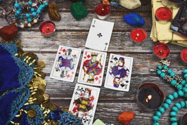 Female fortune teller with Tarot cards. Magic and esoteric background. ESP.