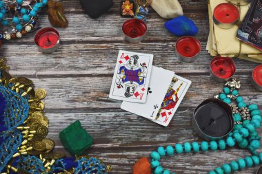 Female fortune teller with Tarot cards. Magic and esoteric background. ESP.