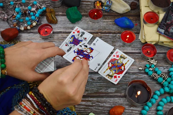 Female fortune teller with Tarot cards. Magic and esoteric background. ESP. — Stockfoto