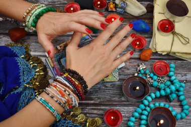 A fortune teller with cards. The prediction of future destiny. Mystical occult rituals.