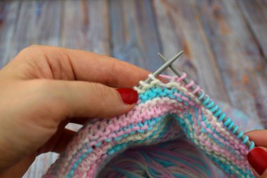 Hobbies for seniors. To knit. Products of wool.