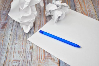  writers talent. Pen and crumpled paper.