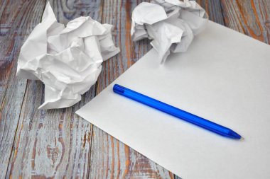  writers talent. Pen and crumpled paper.