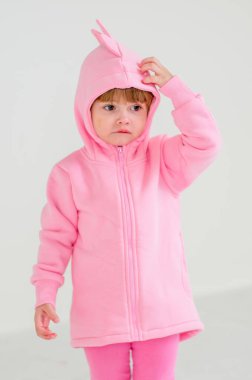 A little girl of two years in the Studio. Children's clothing store.
