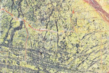 Doğal taş duvar. Dağ desenli yüzey. Katı granit