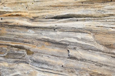 Doğal taş duvar. Dağ desenli yüzey. Katı granit