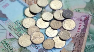 Yüzey arka plan dönen üzerinde Arap para BAE dirhem