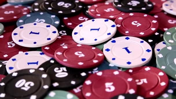 Poker chips on rotating surface — Stock Video