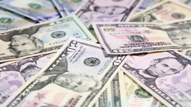 Yüzey arka plan dönen üzerinde American para dolar.