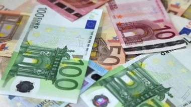 Yüzey arka plan dönen üzerinde Avrupa banknot euro
